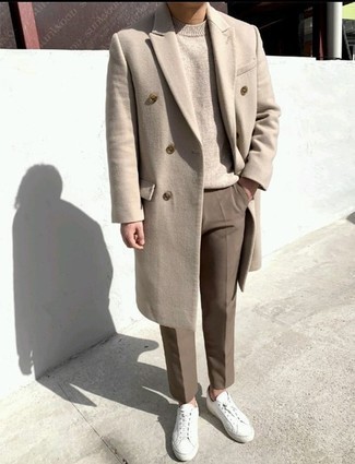 Camel Overcoat Warm Weather Outfits: Such items as a camel overcoat and brown chinos are an easy way to introduce some polish into your casual repertoire. If you want to instantly dial down your look with shoes, why not add white canvas low top sneakers to this ensemble?
