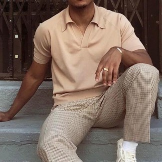 Tan Polo Outfits For Men: This ensemble with a tan polo and beige check chinos isn't so hard to create and is easy to adapt throughout the day. For something more on the daring side to complete your outfit, complement your ensemble with a pair of white canvas high top sneakers.