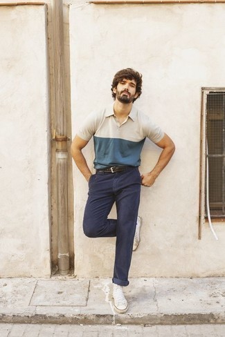 Tan Polo Outfits For Men: If you're planning for a sartorial situation where comfort is top priority, consider teaming a tan polo with navy chinos. Switch up your getup with a pair of white canvas high top sneakers.