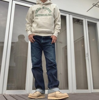 Beige Suede Casual Boots Outfits For Men: A beige print hoodie and navy jeans worn together are a perfect match. You could perhaps get a little creative on the shoe front and elevate your look by slipping into a pair of beige suede casual boots.