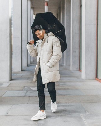 Puffer Coat Outfits For Men: You'll be surprised at how easy it is for any gent to pull together this off-duty look. Just a puffer coat and charcoal chinos. Finishing with white leather low top sneakers is the simplest way to introduce a more laid-back feel to this outfit.