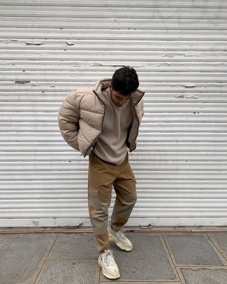 Beige Puffer Jacket Outfits For Men: Combining a beige puffer jacket with khaki cargo pants is a smart option for a casually stylish ensemble. If you need to immediately play down this look with a pair of shoes, why not complete your outfit with beige athletic shoes?