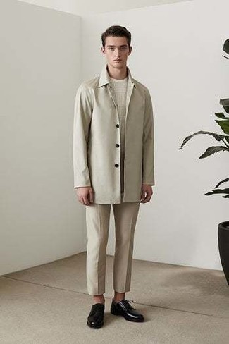Beige Raincoat Outfits For Men: A beige raincoat and beige chinos are amazing menswear staples that will integrate perfectly within your daily off-duty wardrobe. You can go down a classier route in the footwear department by slipping into black leather derby shoes.