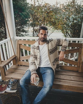 Tan Fair Isle Shawl Cardigan Outfits For Men: To pull together an off-duty ensemble with a twist, consider pairing a tan fair isle shawl cardigan with navy jeans.