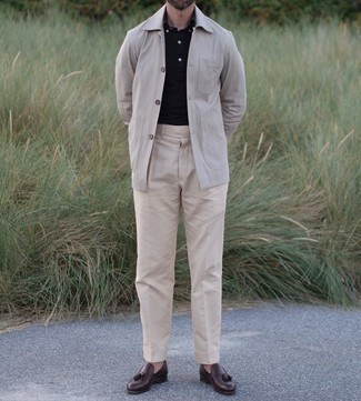 Beige Shirt Jacket Outfits For Men: This getup clearly illustrates that it pays to invest in such elegant menswear items as a beige shirt jacket and beige dress pants. If you don't know how to round off, a pair of dark brown leather tassel loafers is a nice idea.