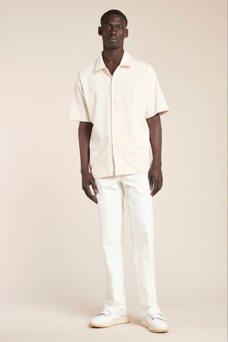 White Chinos Outfits: Wear a beige short sleeve shirt with white chinos to put together an interesting and modern-looking off-duty outfit. When in doubt about what to wear in the shoe department, go with a pair of white leather low top sneakers.