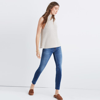 Beige Sleeveless Turtleneck Outfits: For a laid-back outfit, pair a beige sleeveless turtleneck with blue skinny jeans — these two items fit really great together. Finishing with brown suede loafers is an effortless way to infuse a bit of polish into this getup.