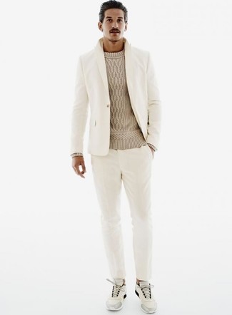 Tan Cable Sweater Outfits For Men: Try teaming a tan cable sweater with a beige suit to look like a perfect gent. Complete your ensemble with a pair of grey athletic shoes to infuse an element of stylish casualness into your outfit.