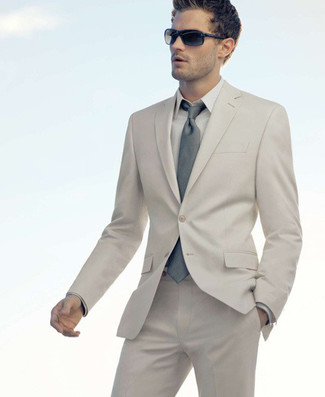 Tan Dress Shirt Outfits For Men: For sophisticated style with a modern finish, pair a tan dress shirt with a beige suit.