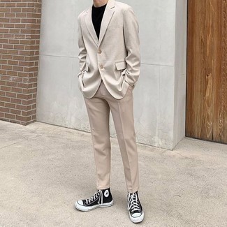 Beige Suit Outfits: Showcase your classy side by wearing a beige suit and a black crew-neck t-shirt. A pair of black and white canvas high top sneakers can easily dial down an all-too-refined look.