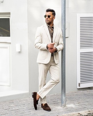 Tan Suit Outfits: You'll be surprised at how easy it is to throw together this elegant look. Just a tan suit and brown dress pants. Dark brown suede tassel loafers are an effective way to add a little kick to the look.