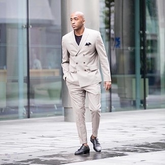 Charcoal Leather Monks Outfits: A beige suit and a dark brown crew-neck t-shirt are the kind of effortlessly sleek pieces that you can wear for years to come. Balance your ensemble with a classier kind of footwear, such as these charcoal leather monks.