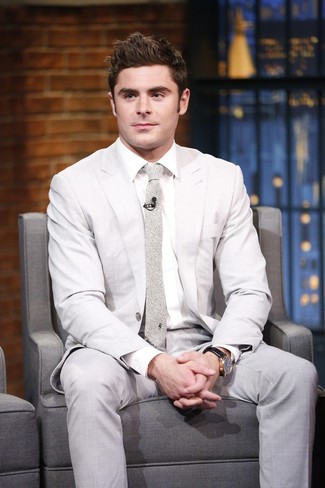Zac Efron wearing Beige Suit, White Dress Shirt, Beige Print Tie