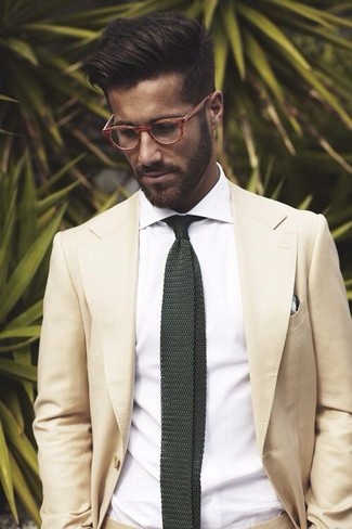 Dark Green Knit Tie Outfits For Men: You're looking at the hard proof that a beige suit and a dark green knit tie are amazing when paired together in an elegant outfit for today's gentleman.