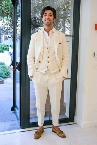Beige Suede Tassel Loafers Outfits: For a look that's nothing less than envy-worthy, pair a beige three piece suit with a white dress shirt. A pair of beige suede tassel loafers easily ups the appeal of this ensemble.
