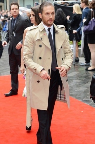 Rock a beige trenchcoat with a black suit for a truly stylish outfit.