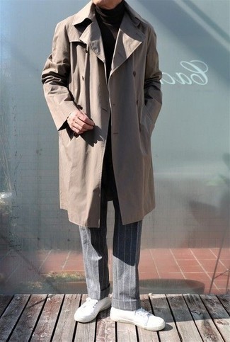 Trenchcoat Outfits For Men: This combo of a trenchcoat and grey vertical striped wool chinos is proof that a straightforward look doesn't have to be boring. For a more laid-back vibe, introduce a pair of white canvas low top sneakers to your ensemble.