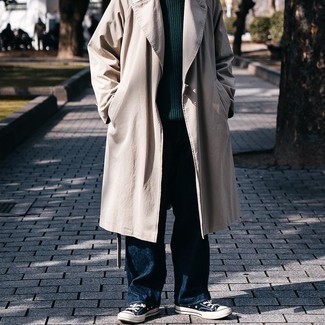 Beige Coat Outfits For Men: Inject a classy touch into your day-to-day styling collection with a beige coat and navy jeans. A pair of navy and white canvas low top sneakers effortlessly amps up the wow factor of any ensemble.