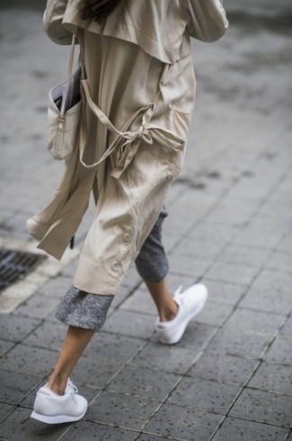 Beige Canvas Crossbody Bag Outfits: For something on the cool and casual end, test drive this combination of a beige trenchcoat and a beige canvas crossbody bag. Don't know how to finish off? Add a pair of white athletic shoes to your look for a more laid-back vibe.