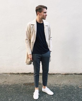 Tan Trenchcoat Outfits For Men: When the dress code calls for a classy yet killer ensemble, you can easily rely on a tan trenchcoat and navy chinos. Finishing with white canvas low top sneakers is a guaranteed way to infuse a sense of stylish nonchalance into your ensemble.