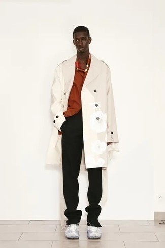 Trenchcoat Outfits For Men: Pair a trenchcoat with black chinos for a neat elegant outfit. Add a pair of grey athletic shoes to the mix to jazz things up.