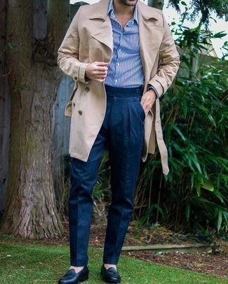 Tan Trenchcoat Outfits For Men: Combining a tan trenchcoat and navy linen dress pants is a guaranteed way to inject your styling repertoire with some rugged elegance. Introduce a pair of navy leather loafers to the mix to bring a sense of stylish casualness to your ensemble.
