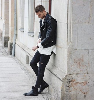 White Cable Sweater Outfits For Men: A white cable sweater and black ripped skinny jeans teamed together are the perfect combo for guys who love casual styles. Rounding off with a pair of black leather chelsea boots is a fail-safe way to add a little depth to this outfit.