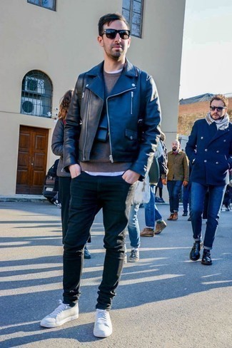 White Low Top Sneakers Outfits For Men: This relaxed combo of a black leather biker jacket and black skinny jeans is a safe option when you need to look stylish in a flash. Why not take a smarter approach with footwear and enter white low top sneakers into the equation?