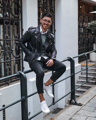 Black Vertical Striped Chinos Outfits: This combination of a black leather biker jacket and black vertical striped chinos is pulled together and yet it's laid-back enough and apt for anything. Introduce a pair of white canvas low top sneakers to the mix and off you go looking awesome.