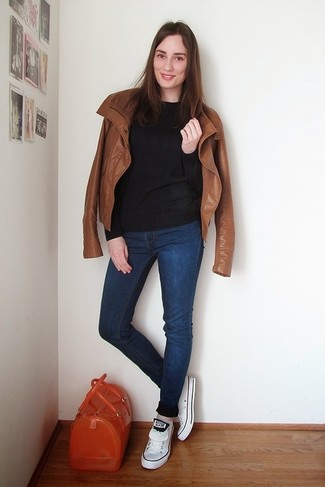 Brown Leather Biker Jacket Outfits For Women: This ensemble with a brown leather biker jacket and navy skinny jeans isn't hard to score and easy to change. A pair of white low top sneakers will easily tone down an all-too-perfect look.