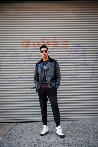 Black Sunglasses Chill Weather Outfits For Men: Nail the effortlessly dapper look in a black leather biker jacket and black sunglasses. In the shoe department, go for something on the classier end of the spectrum and complement your outfit with a pair of white canvas high top sneakers.