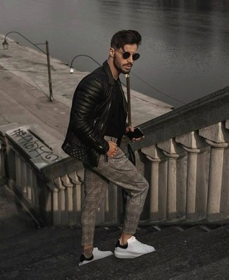 Black Leather Biker Jacket Outfits For Men: Opt for a black leather biker jacket and grey plaid chinos for a seriously stylish, laid-back look. When in doubt about the footwear, stick to white and black canvas low top sneakers.