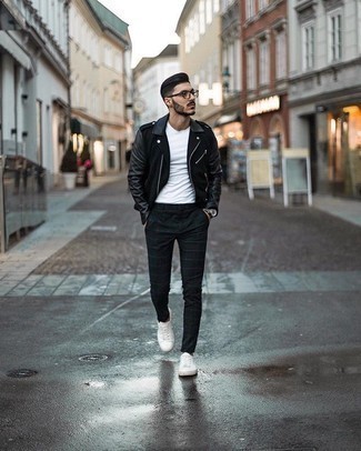 Black Check Chinos Outfits: If it's ease and practicality that you love in an ensemble, make a black leather biker jacket and black check chinos your outfit choice. A pair of white canvas low top sneakers integrates nicely within a great deal of combinations.