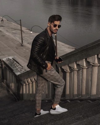 Black Sunglasses Casual Outfits For Men: Choose a black leather biker jacket and black sunglasses for an easy-to-create menswear style. Tap into some David Beckham stylishness and add a pair of white and black leather low top sneakers to the mix.