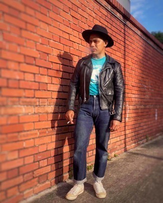 Black Hat Outfits For Men: This combo of a black leather biker jacket and a black hat is super easy to throw together and so comfortable to rock a version of throughout the day as well! Hesitant about how to complete your look? Rock a pair of white canvas low top sneakers to kick it up.