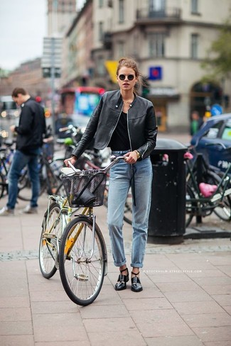 Gold Watch Outfits For Women: Team a black leather biker jacket with a gold watch if you seek to look casually stylish without putting in too much time. And if you want to effortlessly kick up this outfit with a pair of shoes, complement your look with black cutout leather ankle boots.