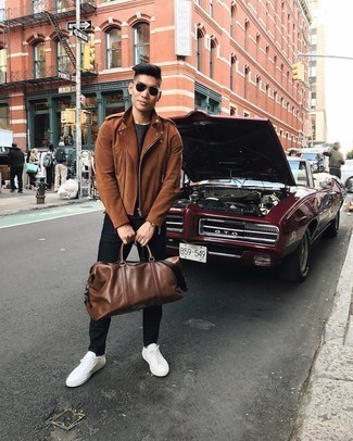 Brown Duffle Bag Outfits For Men: This casually dapper look is super straightforward: a brown suede biker jacket and a brown duffle bag. Rounding off with a pair of white canvas low top sneakers is a surefire way to introduce a bit of depth to this outfit.