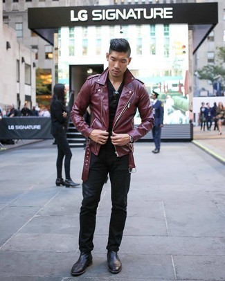 Burgundy Leather Biker Jacket Outfits For Men: This combo of a burgundy leather biker jacket and black jeans is solid proof that a safe off-duty ensemble can still look incredibly stylish. To give this ensemble a more sophisticated touch, why not introduce black leather chelsea boots to the mix?