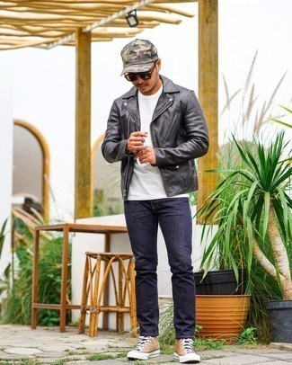 Beige Canvas High Top Sneakers Outfits For Men: This combo of a black leather biker jacket and navy jeans is super easy to do and so comfortable to sport all day long as well! And if you need to effortlessly play down your look with footwear, finish with beige canvas high top sneakers.