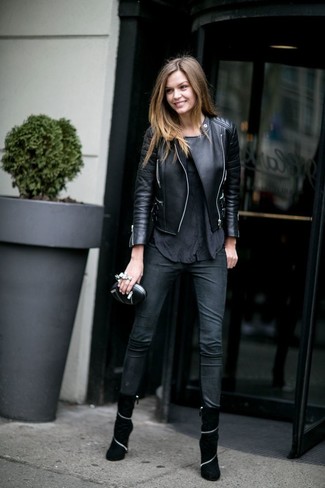 Black Leather Clutch Outfits: This combo of a black leather biker jacket and a black leather clutch spells casual cool and stylish functionality. To add some extra depth to this getup, complement this ensemble with a pair of black suede ankle boots.