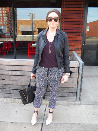 Black Pajama Pants Outfits For Women: A black leather biker jacket and black pajama pants have become a favorite off-duty combo for many fashionable ladies. Rounding off with white and black leather pumps is the simplest way to bring a little depth to this look.