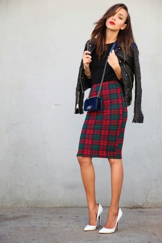 Ashley Madekwe wearing Black Leather Biker Jacket, Black Crew-neck T-shirt, Green and Red Plaid Pencil Skirt, White Leather Pumps