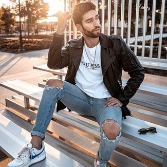 Black Biker Jacket Outfits For Men: To put together a casual menswear style with a twist, you can opt for a black biker jacket and light blue ripped skinny jeans. Feeling inventive today? Mix things up by rocking a pair of white and navy canvas low top sneakers.