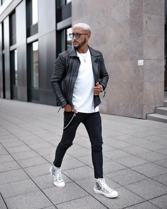 Black Quilted Leather Biker Jacket Outfits For Men: This street style combo of a black quilted leather biker jacket and black ripped skinny jeans is extremely versatile and up for whatever the day throws at you. Complete this look with a pair of grey print canvas high top sneakers to instantly switch up the ensemble.