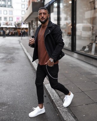 Black Biker Jacket Outfits For Men: Pair a black biker jacket with black skinny jeans for an easy-to-style getup. White canvas low top sneakers are an effective way to transform this getup.
