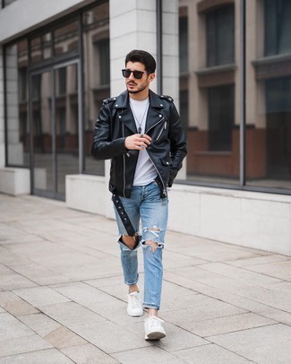 Light Blue Ripped Skinny Jeans Outfits For Men: A black leather biker jacket and light blue ripped skinny jeans are a good ensemble to add to your day-to-day wardrobe. To bring some extra fanciness to your getup, complement this outfit with a pair of white canvas low top sneakers.
