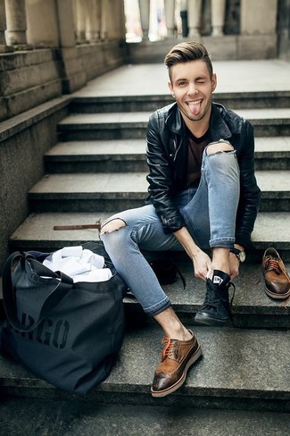 A black leather biker jacket and grey ripped skinny jeans are an edgy combo that every fashionable guy should have in his wardrobe. Brown leather brogues are an easy way to power up your getup.