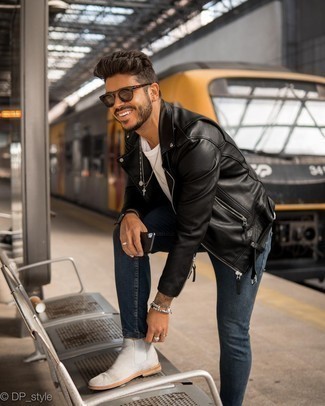 Navy Skinny Jeans Casual Outfits For Men: A black leather biker jacket and navy skinny jeans will add extra dapperness to your casual styling collection. For a dressier vibe, why not introduce grey suede chelsea boots to your ensemble?