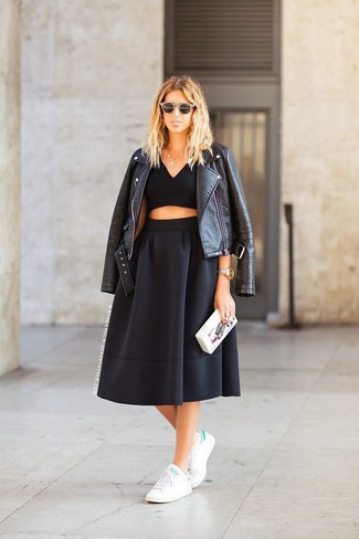 White and Green Low Top Sneakers Outfits For Women: If you're on the hunt for a laid-back yet chic outfit, consider teaming a black leather biker jacket with a black pleated midi skirt. White and green low top sneakers are a simple way to add a dash of playfulness to this outfit.