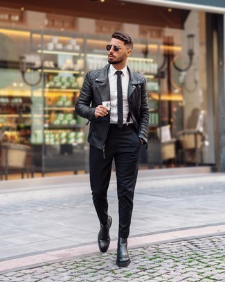 Suspenders Outfits: For casual city style without the need to sacrifice on practicality, we like this pairing of a black leather biker jacket and suspenders. Let your outfit coordination skills truly shine by finishing off your look with black leather chelsea boots.